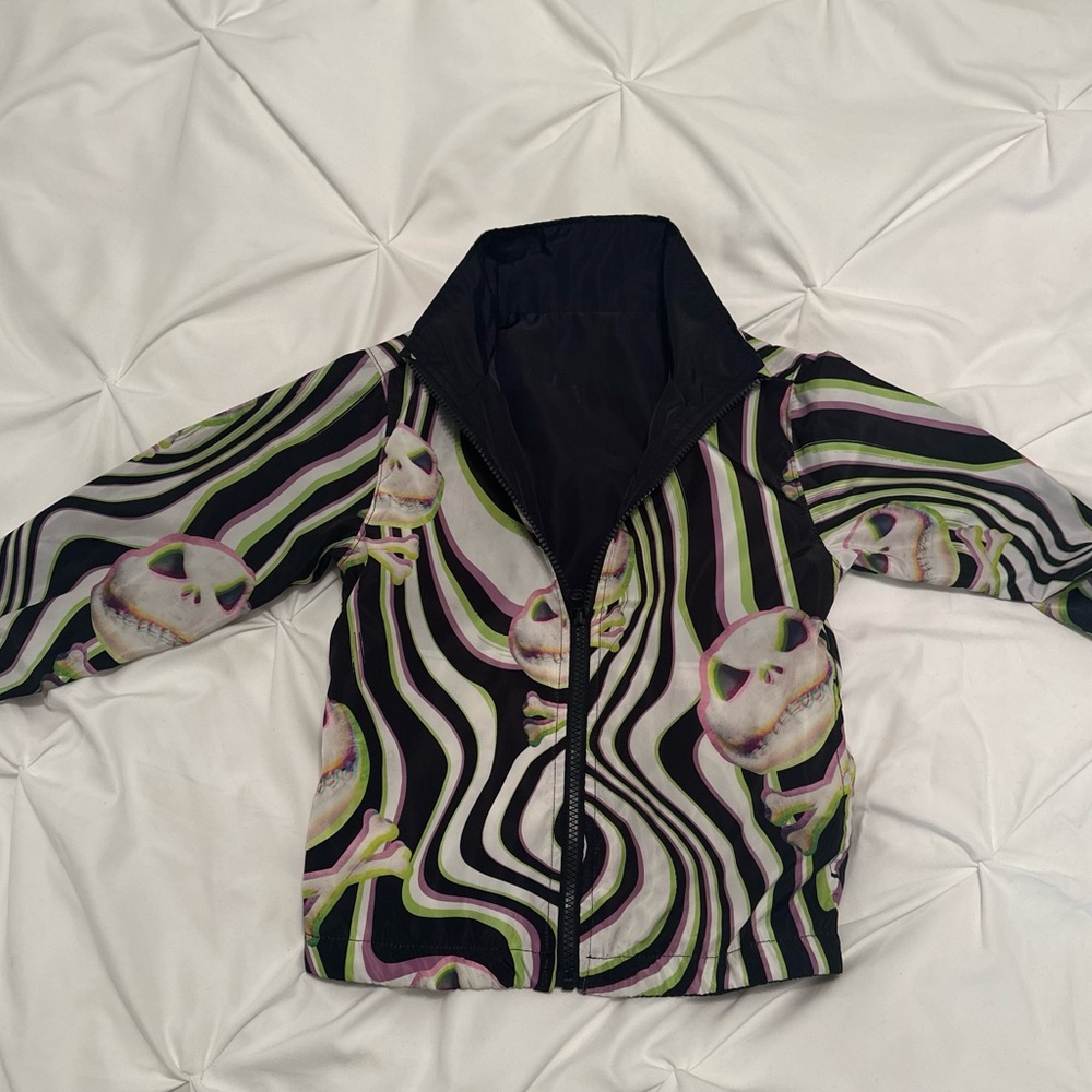 Reversible Jack skellington wind jacket.